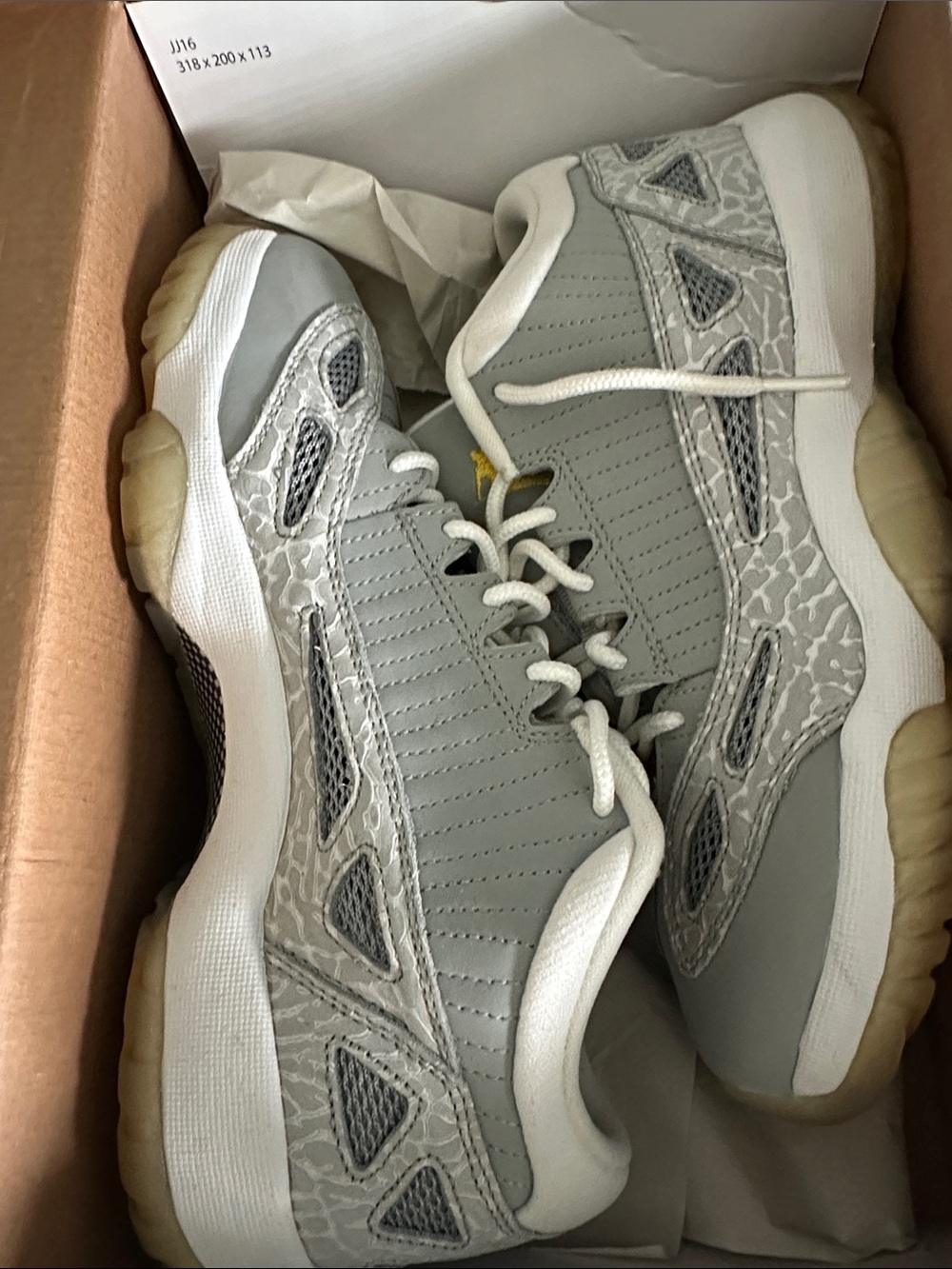 Jordan retro 11. Grey White Low-Top Sneakers.  6.5Y